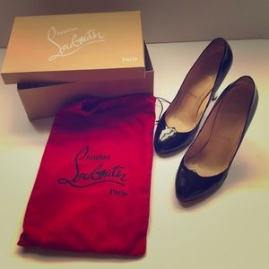Christian Louboutin patent leather w/ silver heels